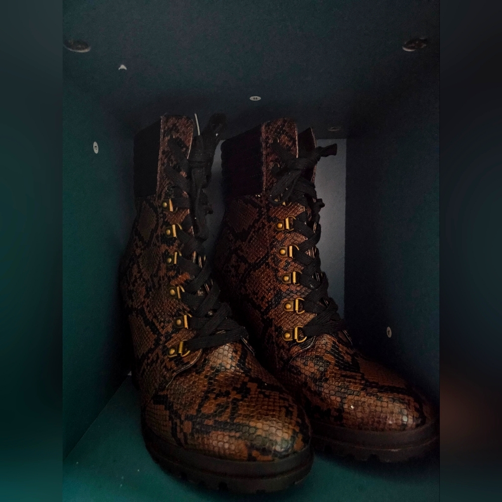 High heeled snake pattern boots